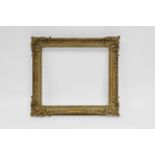 A French Carved Louis XIV/XV Transitional Style Pierced Frame with Decape Finish, 18th century,