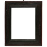 An Italian Ebonised and Painted Cassetta Frame, 17th century, with cavetto sight, plain frieze,