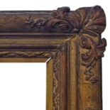 An English Carved and Gilded Louis XIV Style Frame, late 18th century, with gilded slip,