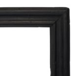 An Italian Ebonised Salvator Rosa Frame, 17th century, with cavetto sight, cushioned torus, hollow,