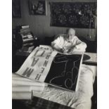 Robert Capa, American 1913-1954- ''Matisse on his bed signing a poster'' Hotel Regina, Nice, 1949;