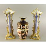 A pair of English porcelain trumpet shaped vases, 19th century,