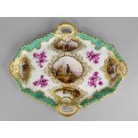 A Meissen lozenge shaped tray, 19th century, moulded with two pierced handles and a woven ground,
