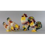 A collection of Wedgwood chickens, 20th century, in various positions feeding and crowing,