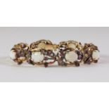 A late 19th early 20th century opal and ruby set bracelet,