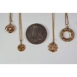 An 18ct gold circular sovereign pendant mount (vacant) with 18ct gold chain and a further 18ct gold