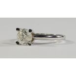 An 18ct white gold, single stone diamond ring, mounted in high four claw setting, approx size M.