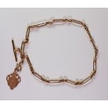 A 9ct gold Albert fetter link watch chain, approx 44cm long,