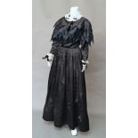 Chanel Boutique: a black silk evening gown, with high organza ruffle to neck,