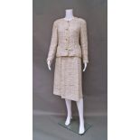 Chanel Boutique: a cream fleck wool boucle two piece skirt and jacket suit,