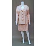 A dusty pink slub silk two piece skirt and jacket suit,