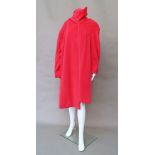 Chanel Boutique: a shocking pink Angora/wool mix coat, raglan sleeves, pleated and flared from yoke,