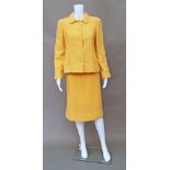Chanel Creations: a peach wool slub skirt and jacket suit,