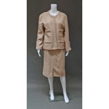 Chanel Boutique: a cream wool loose weave skirt and jacket suit,