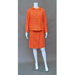 Chanel couture (unlabelled) a tangerine textured wool weave skirt and jacket suit with matching