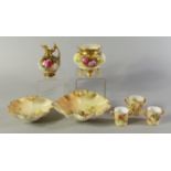 Two Royal Worcester porcelain peach bloom and gilt shell shaped dishes,