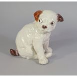 A French Caen pottery model of a bull dog, incised to the base J Filmont, Caen, France,