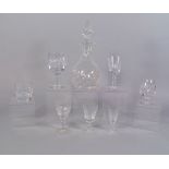 A suite of drinking glasses, 20th century, to comprise a decanter with stopper, six spirit tumblers,