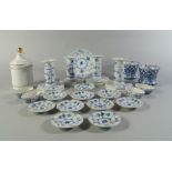 A set of four Royal Copenhagen porcelain candlesticks, 11cm high, a set of ten shallow small plates,
