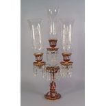 A ruby and gilt glass four light candelabra, late 19th/early 20th century, possibly Bohemian,