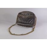 Chanel: a black lambskin leather quilted bag, zip closure, front wall flap pocket,