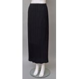 An Issey Miyake white label black pleated skirt, labeled size 3,