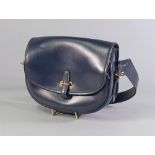 Hermes: a navy blue leather saddle bag, c.