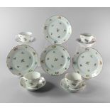 A Hutschenreuther part tea service, 20th century, printed with sprays of flowers,