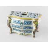 A Continental faience bulb pot, 19th century, in the form of a bombe commode,