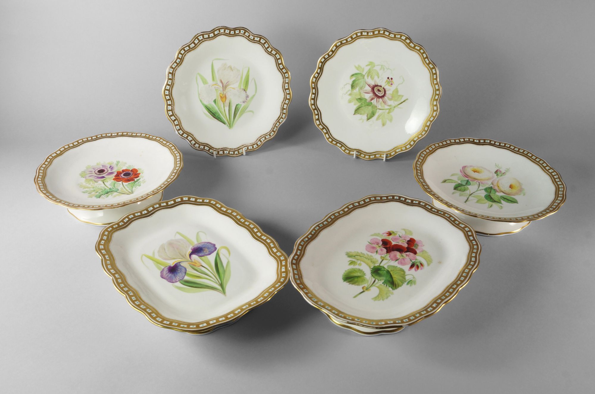 An English porcelain dessert service, mid 19th century,