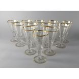 A set of twelve wine glasses, 20th century, of inverted trumpet form, on spreading foot,