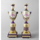 A pair of Continental porcelain enamel coloured and gilt cassolette vases and covers,