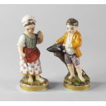 Two Continental porcelain figures of children, 19th century,