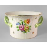 A Herend porcelain ice bucket, 20th century, with two handles, moulded with basket work body,