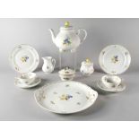 A Furstenburg porcelain tea set for six people, late 20th century, decorated with sprays of fruit,