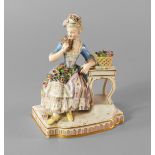 A Meissen porcelain figure of a girl, late 19th century/early 20th century,