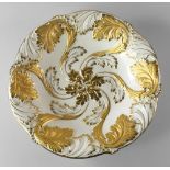 A Meissen porcelain plate, late 19th/early 20th century, moulded and gilt with acanthus leaves,