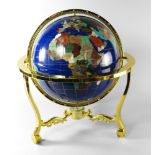 A large gilt metal and enamel globe, late 20th century, the frame base inset with a compass,