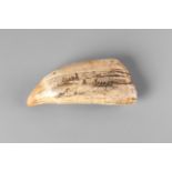 A Scrimshaw whales tooth, 19th century,