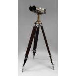 A set of chromed metal and brass observation binoculars, 20th century, on a wooden tripod,