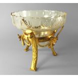 A gilt metal and glass tazza, 20th century, the glass bowl with foliate etched decoration,