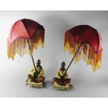 A pair of Bergman style cold painted table lamps,