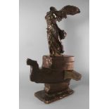 A French bronze model of the Victory of Samothrace , known as the Nike of Samothrace,