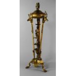 A gilt metal lamp, in the form of an Athenienne, 20th century,