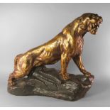 After Thomas Francois Cartier, French, 1879 - 1943 a spelter model of a snarling tiger,