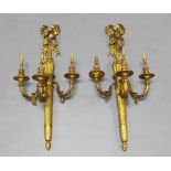 A pair of gilt wood three branch wall appliques, late 20th/early 21st century,