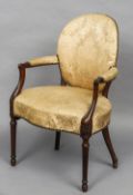 A 19th century mahogany framed upholstered open armchair
With brass studded upholstery,