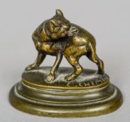 A small 19th century patinated bronze model of a dog
Naturalistically cast, the base signed C.