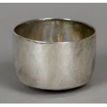 A silver beaker, possibly Irish
Of simple form, inscribed to underside MW to MD.  5.5 cm high.
