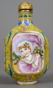 A Canton enamel snuff bottle
Decorated with scenes of a European girl,